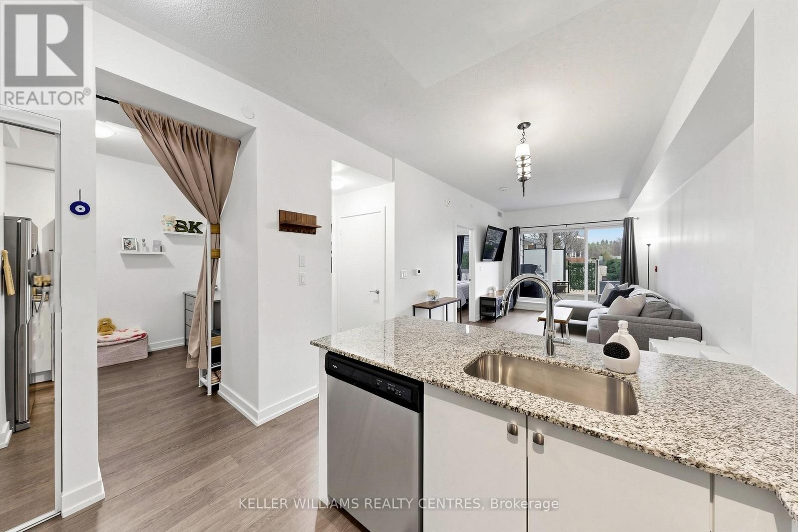 #101 555 WILLIAM GRAHAM DRIVE - 19