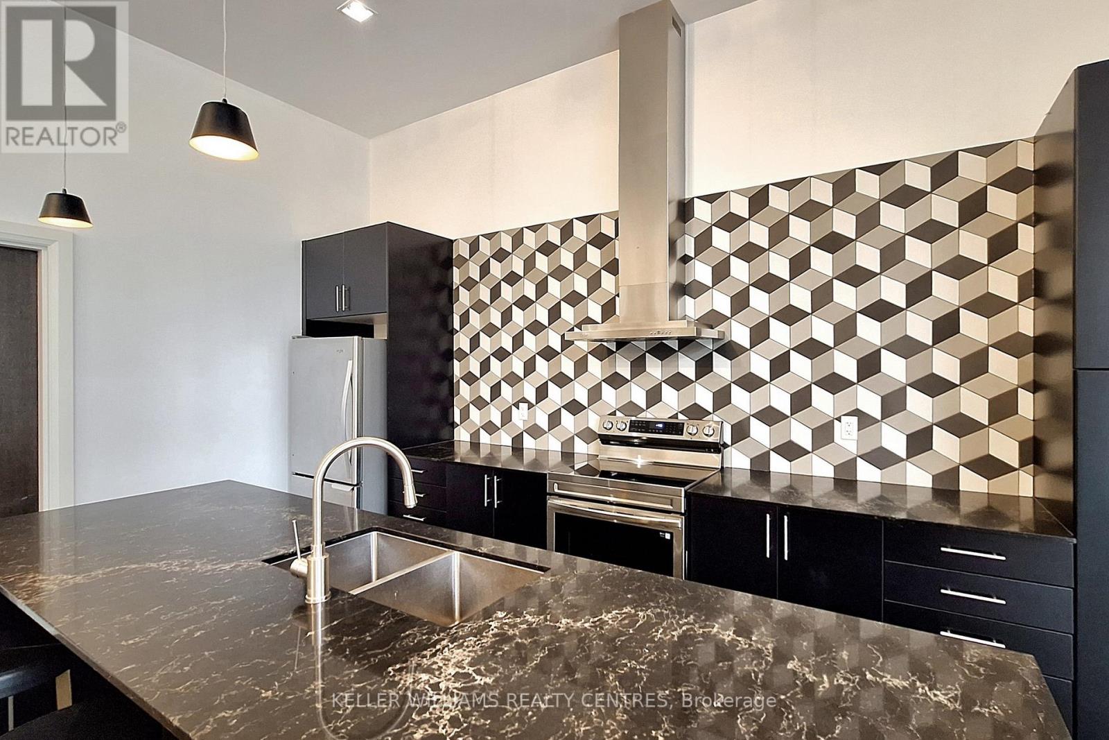 #101 555 WILLIAM GRAHAM DRIVE - 42