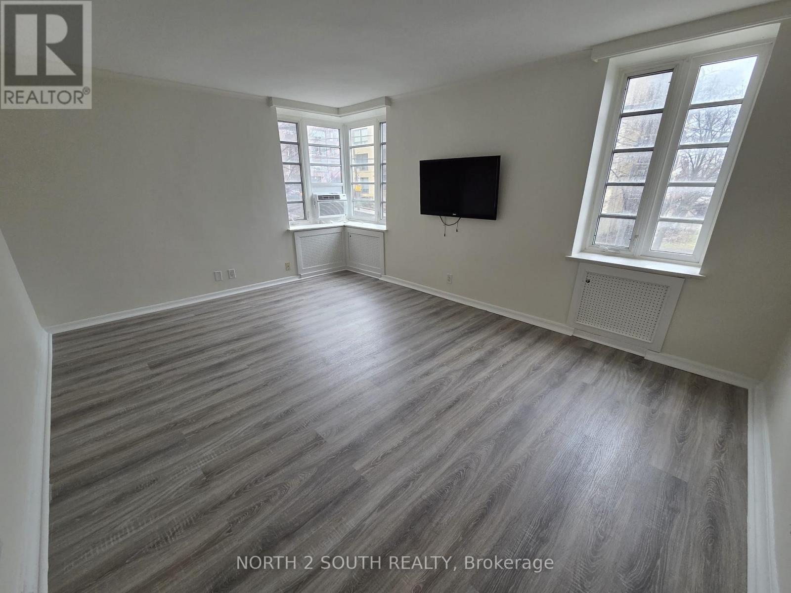 #210 707 EGLINTON AVENUE W - 1