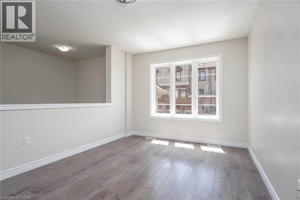70 WILLOWRUN Drive Unit# J-3, Kitchener, Ontario, N2A0J3 — Photo 4