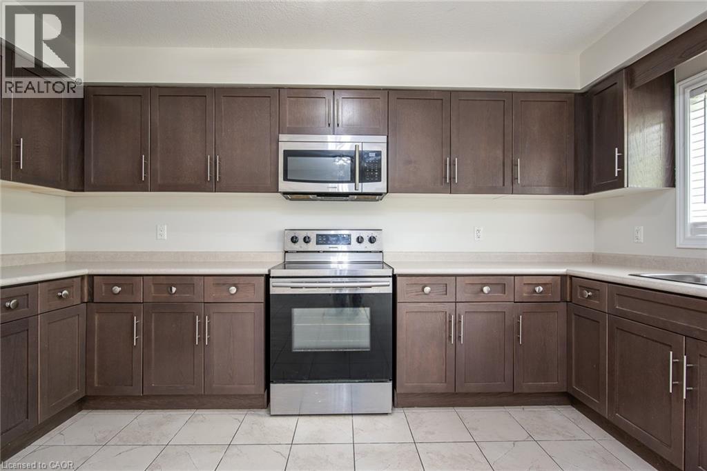 70 WILLOWRUN Drive Unit# J-3, Kitchener, Ontario, N2A0J3 — Photo 6