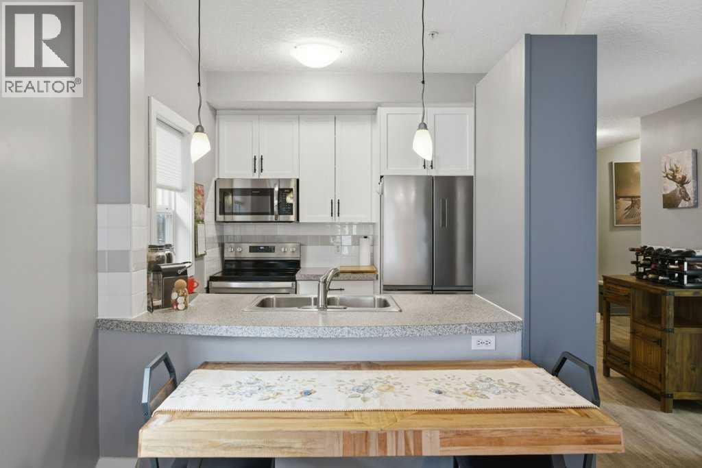 #102 1235 13 Avenue SW - 21