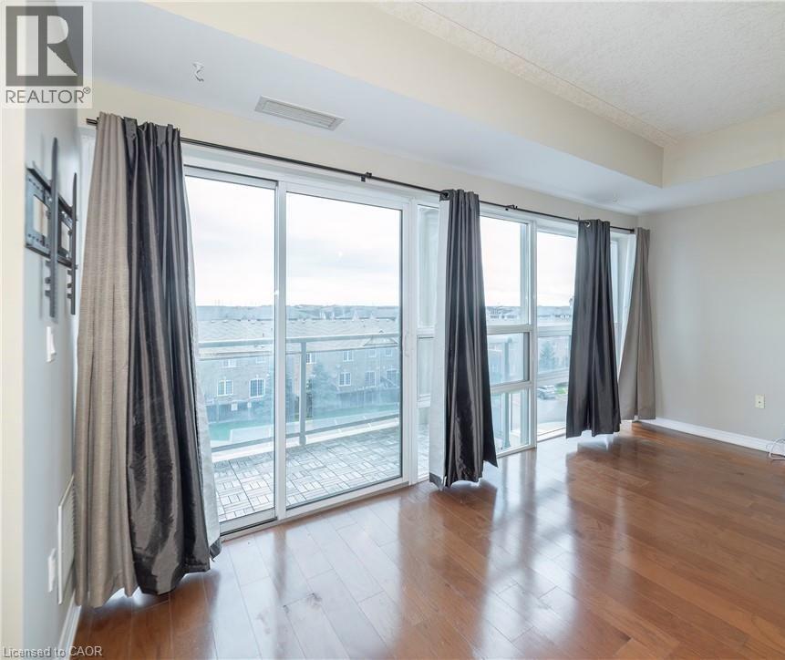 1419 COSTIGAN Road Unit# 403, Milton, Ontario, L9T2L4 — Photo 2
