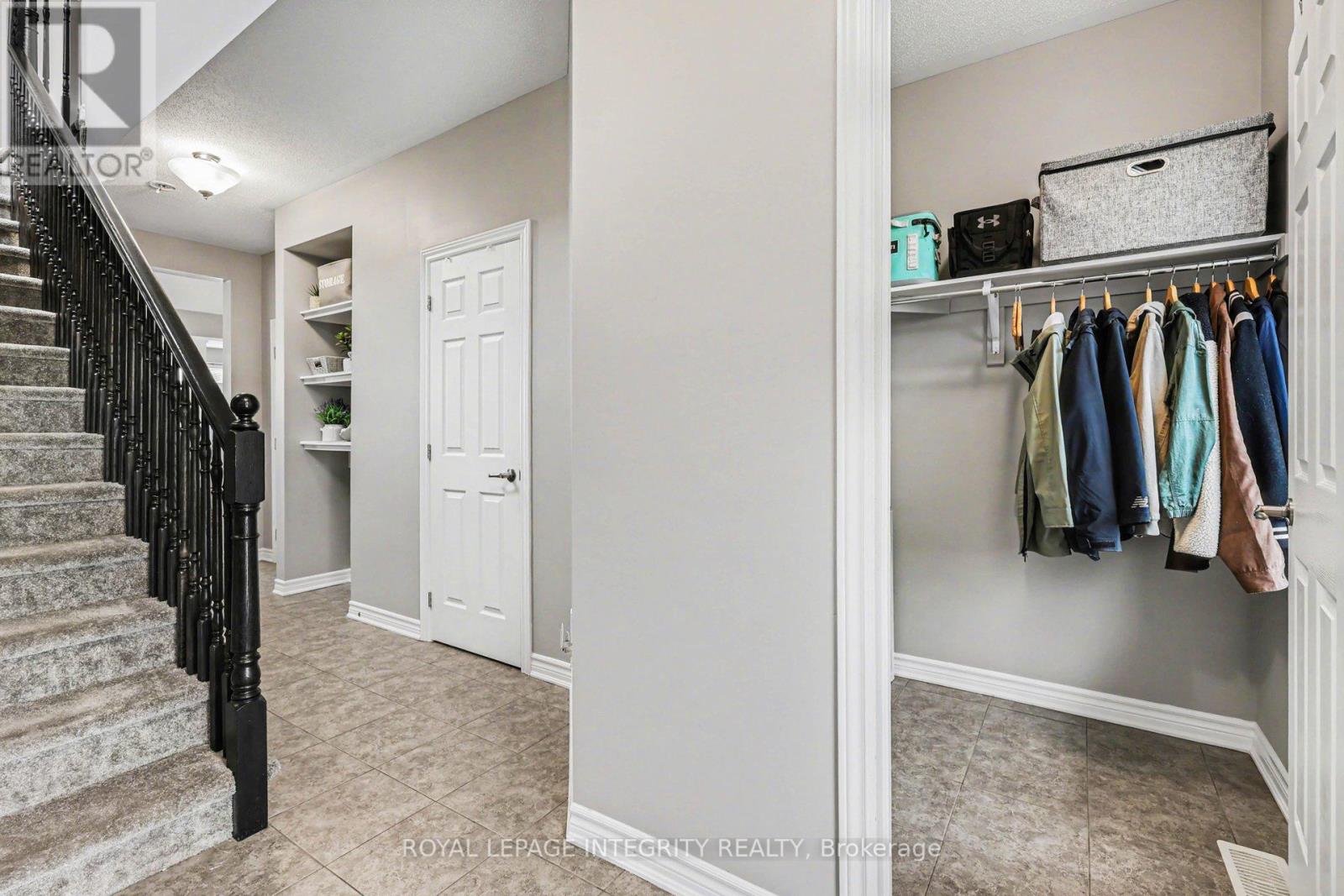 Tiled foyer. Interior garage entry.