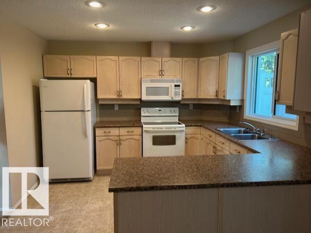#50 9630 176 ST NW - 13