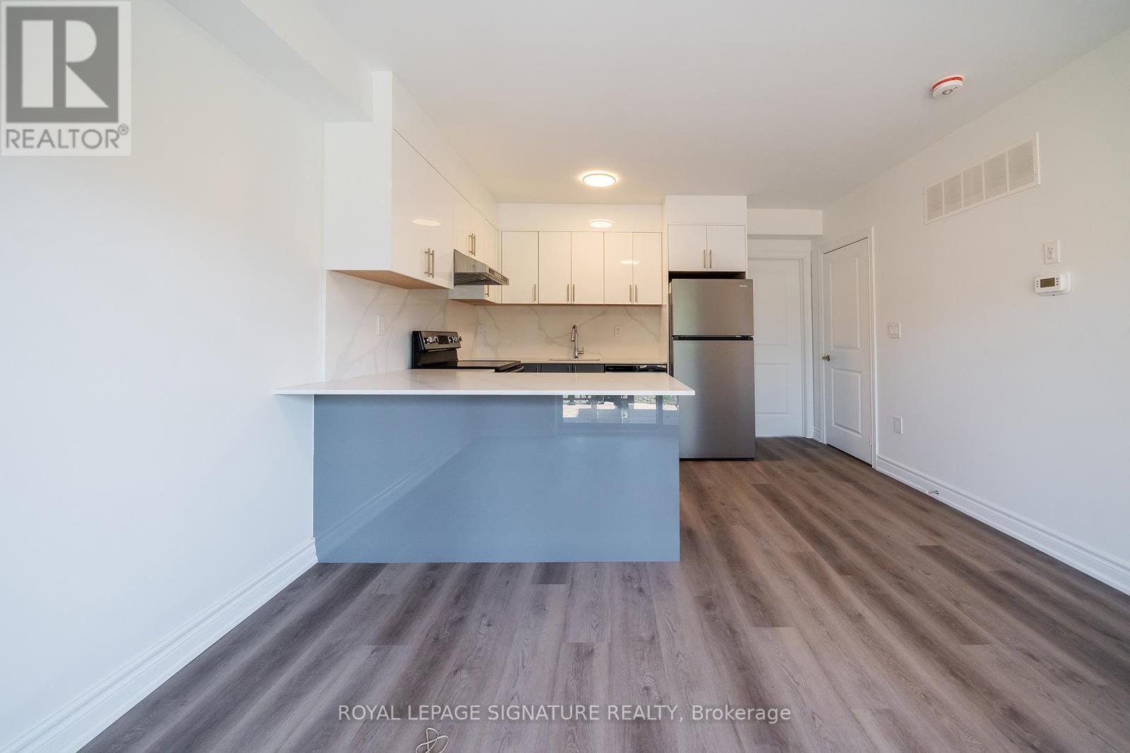 Listing photo of 1 - 2052 PHARMACY AVENUE