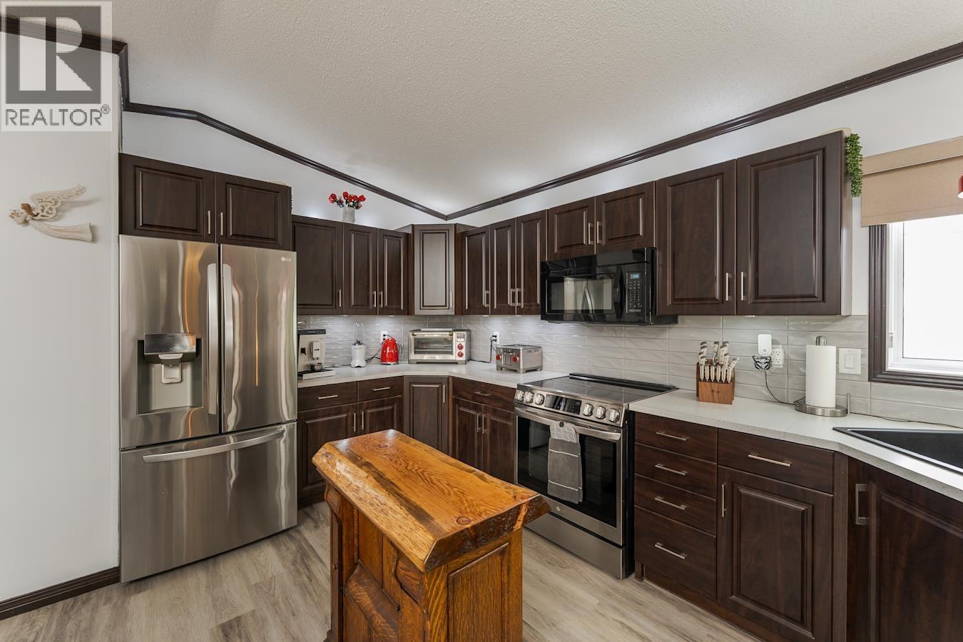 Photo 8 of 34 — 115 1000 INVERNESS ROAD · Prince George, BC