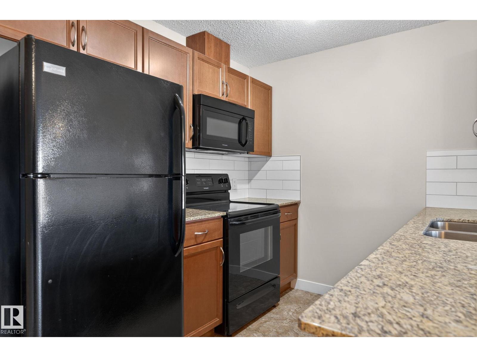#309 12660 142 AV NW - 24