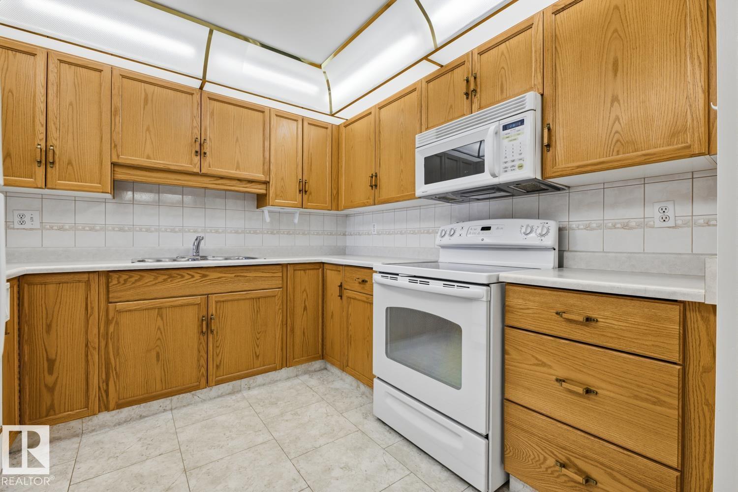 #208 9926 100 AV - 5