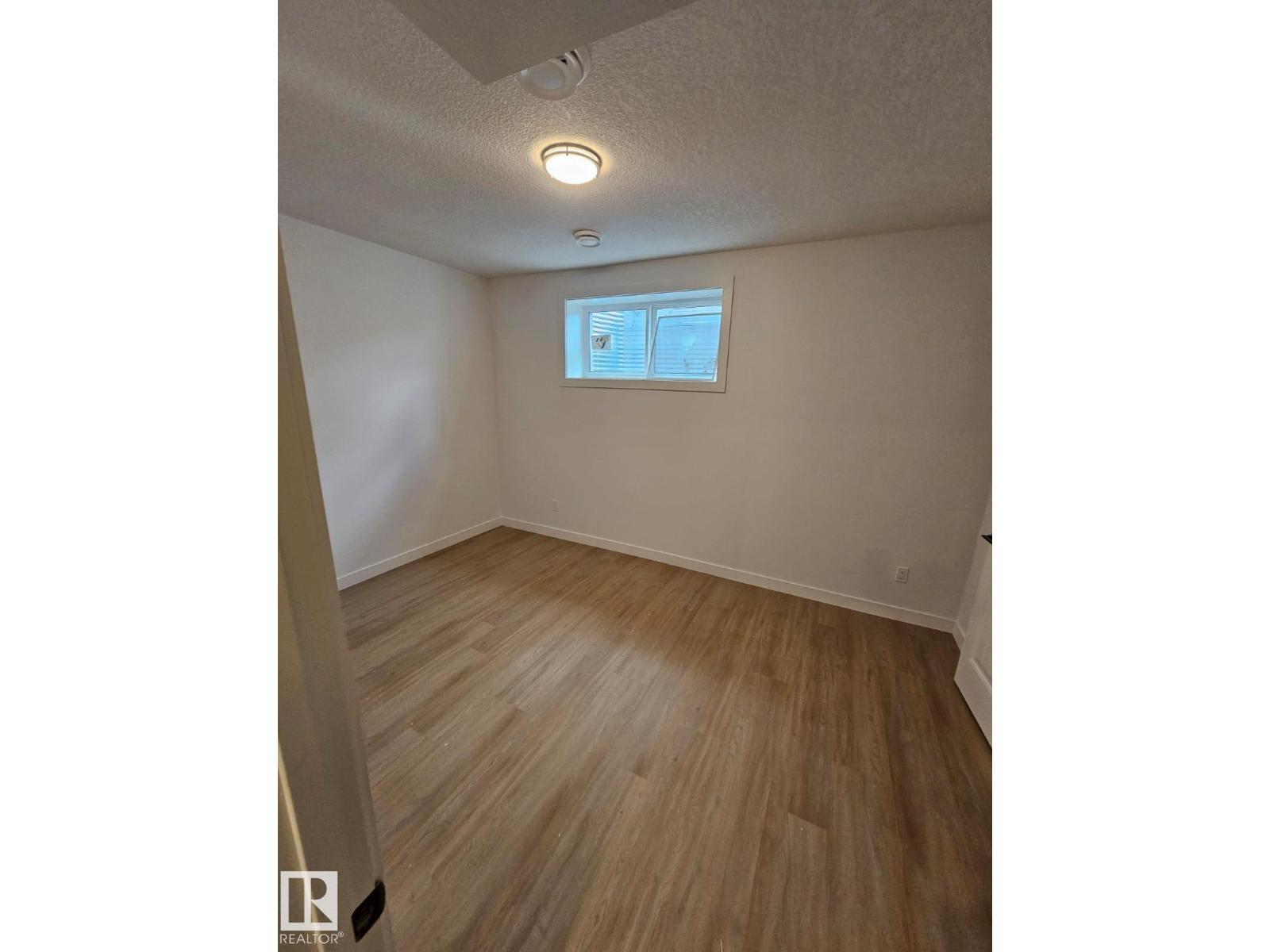 Basement 9806 107 Morinville Avenue