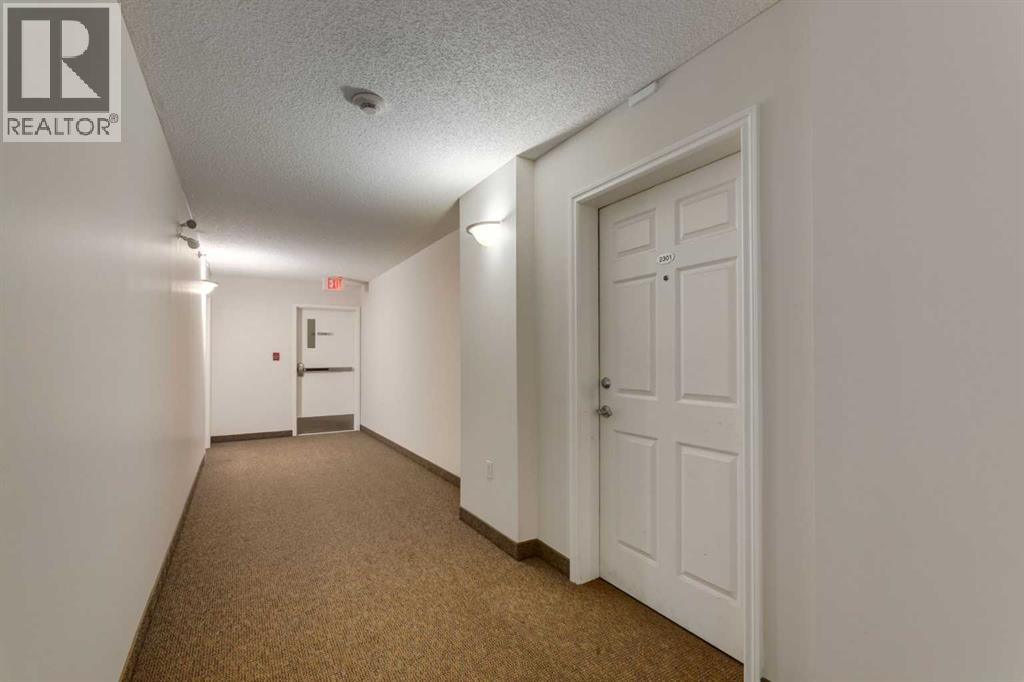 #2301 950 Arbour Lake Road NW - 6