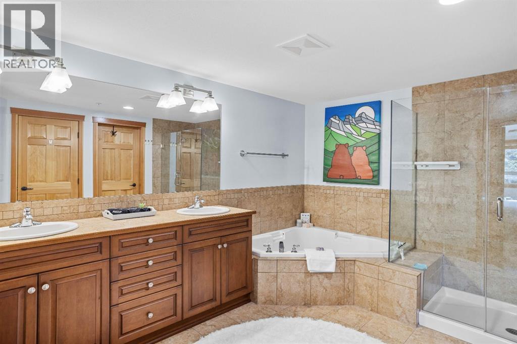 Ensuite with soaker tub & dual vanities