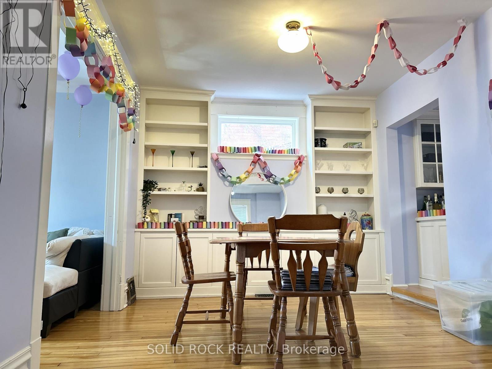 Dining room with lots of display shelves