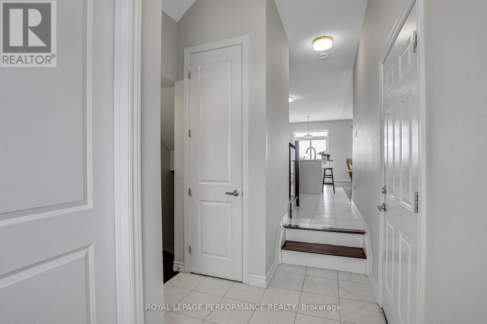 Front Entry with Coat Closet & Entry to Garage