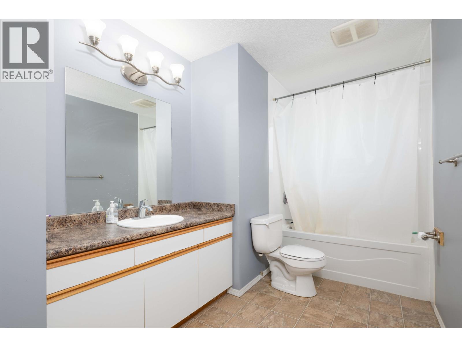 Photo 8 of 26 — 1478 MCCULLAGH AVENUE · Prince George, BC