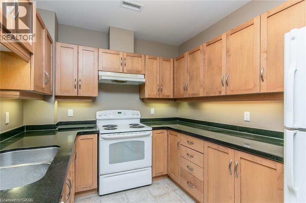 165 DUKE Street E Unit# 211, Kitchener, Ontario, N2H6T8 — Photo 25