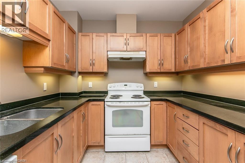 165 DUKE Street E Unit# 211, Kitchener, Ontario, N2H6T8 — Photo 23