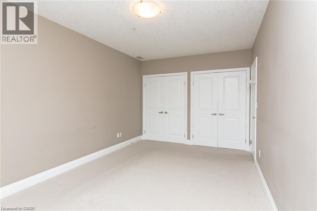 165 DUKE Street E Unit# 211, Kitchener, Ontario, N2H6T8 — Photo 31