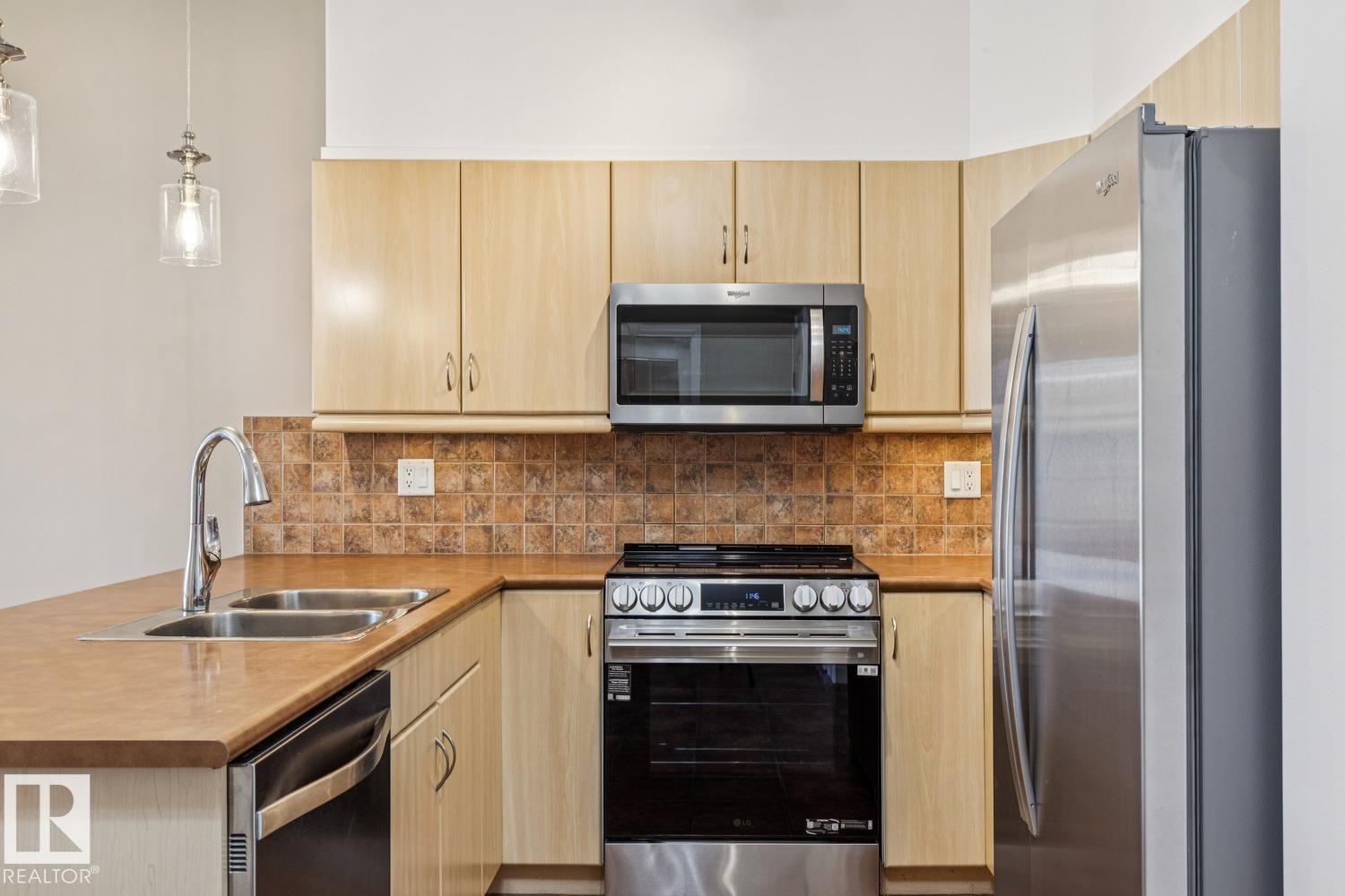 #310 1406 HODGSON WY NW - 10