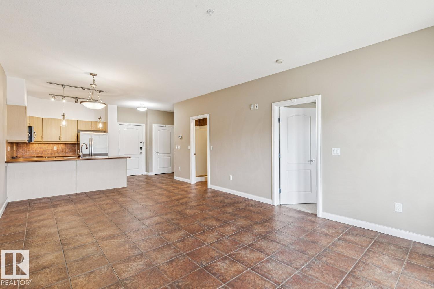 #310 1406 HODGSON WY NW - 15