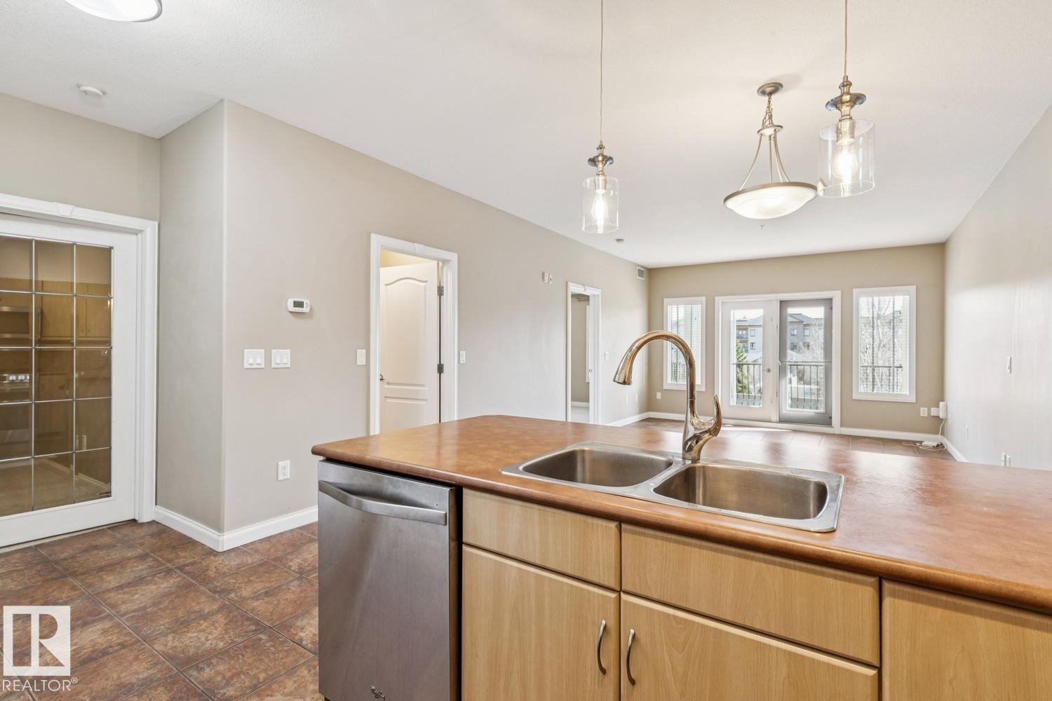 #310 1406 HODGSON WY NW - 12