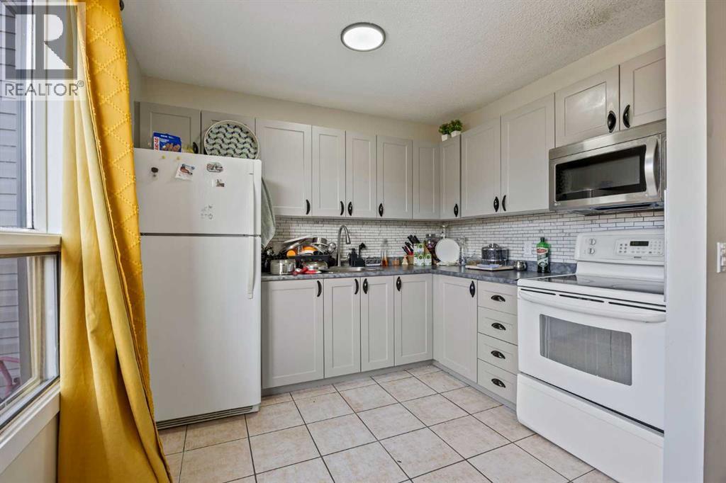 #8 4360 58 Street NE - 9