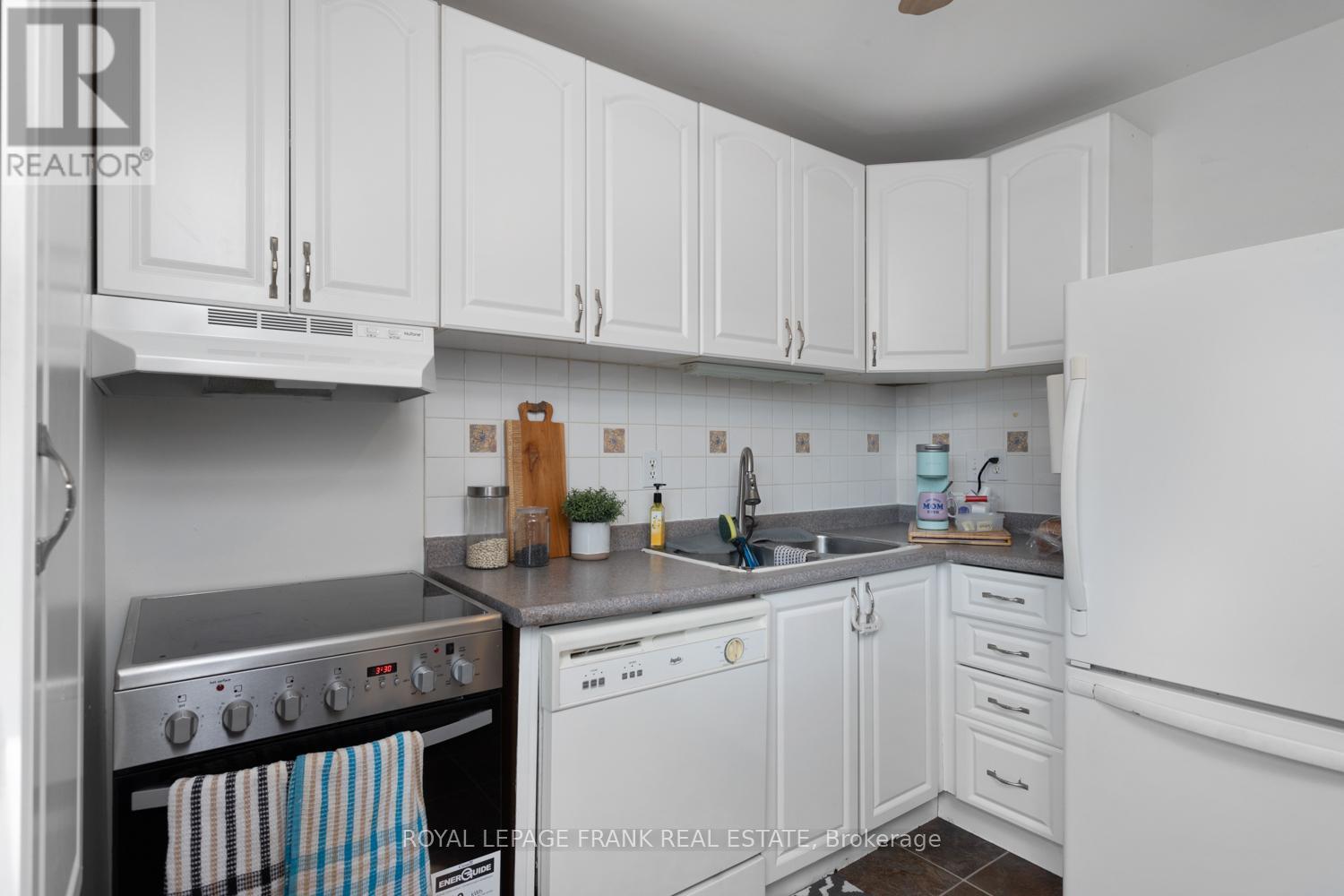 #42 700 HARMONY ROAD N - 8