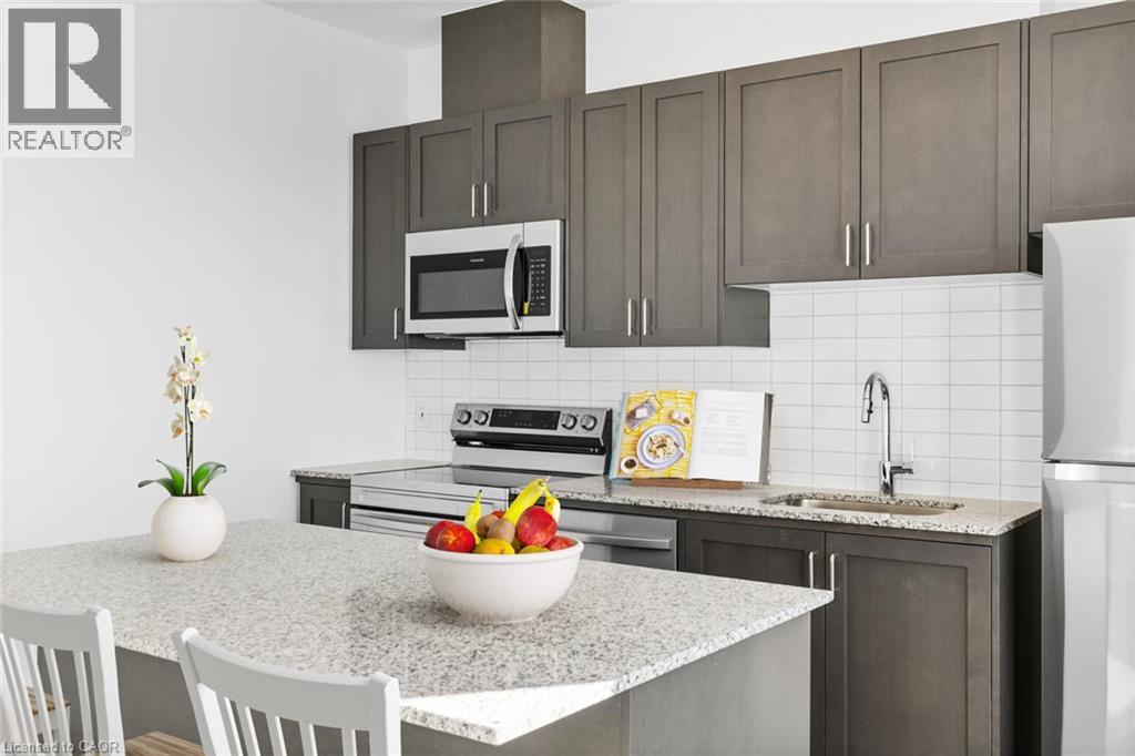 3285 CARDING MILL Trail Unit# 403, Oakville, Ontario, L6M1S1 — Photo 2