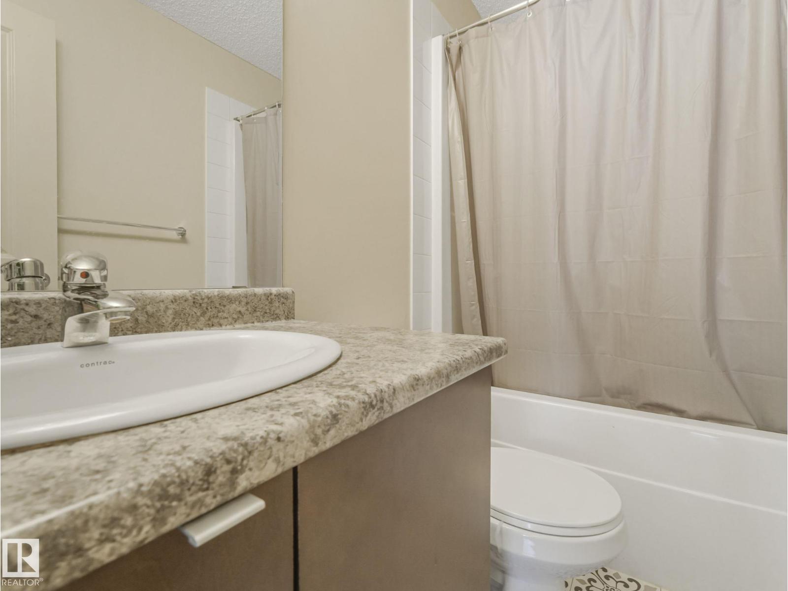 #110 508 ALBANY WY NW - 26