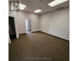 I - 4 Cedar Pointe Drive, Barrie, ON L4N5R7 Photo 6
