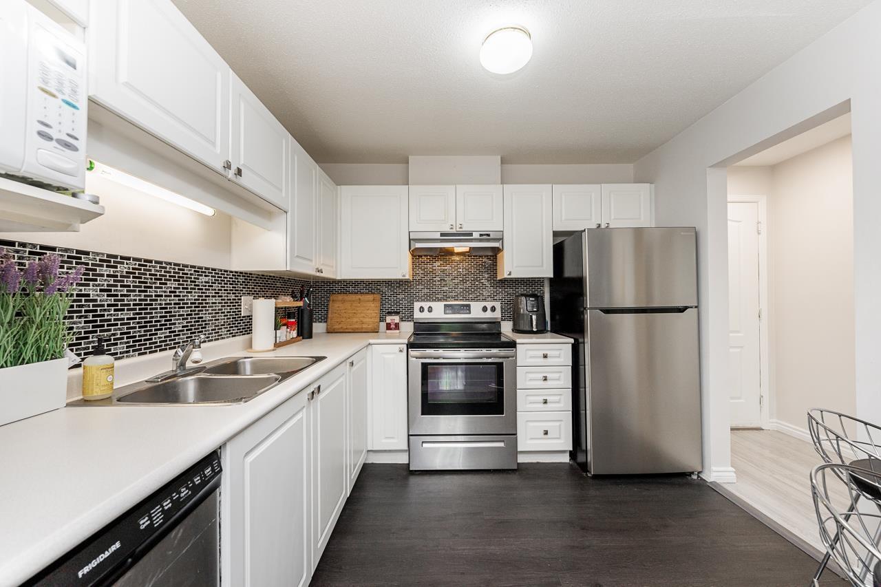 101 5765 GLOVER ROAD — photo 9