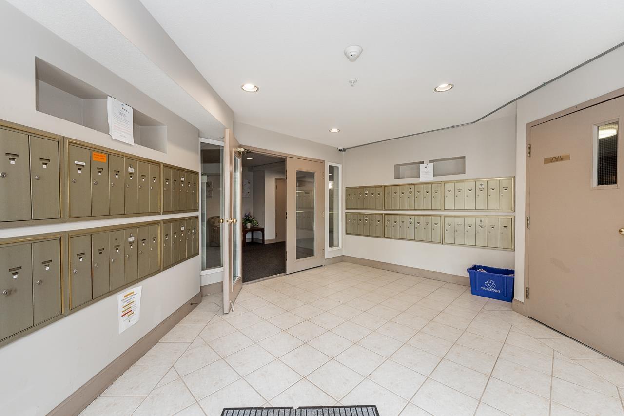 101 5765 GLOVER ROAD — photo 6