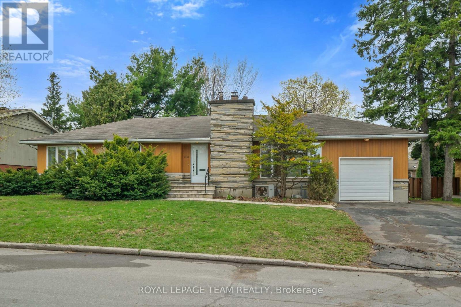 Welcome to this classic mid-century bungalow