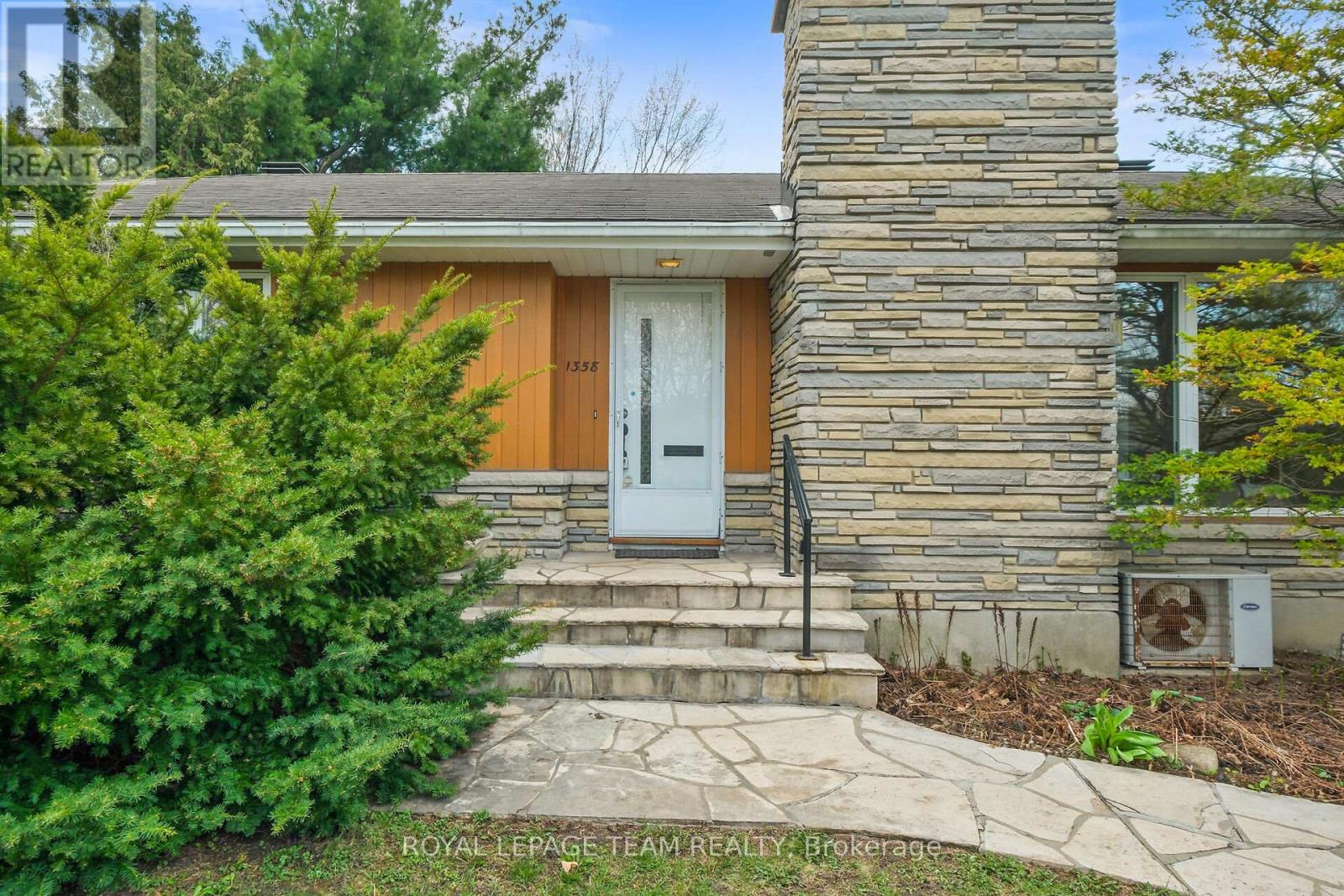 Set on a south 85 ft. x 100 ft. pool sized lot