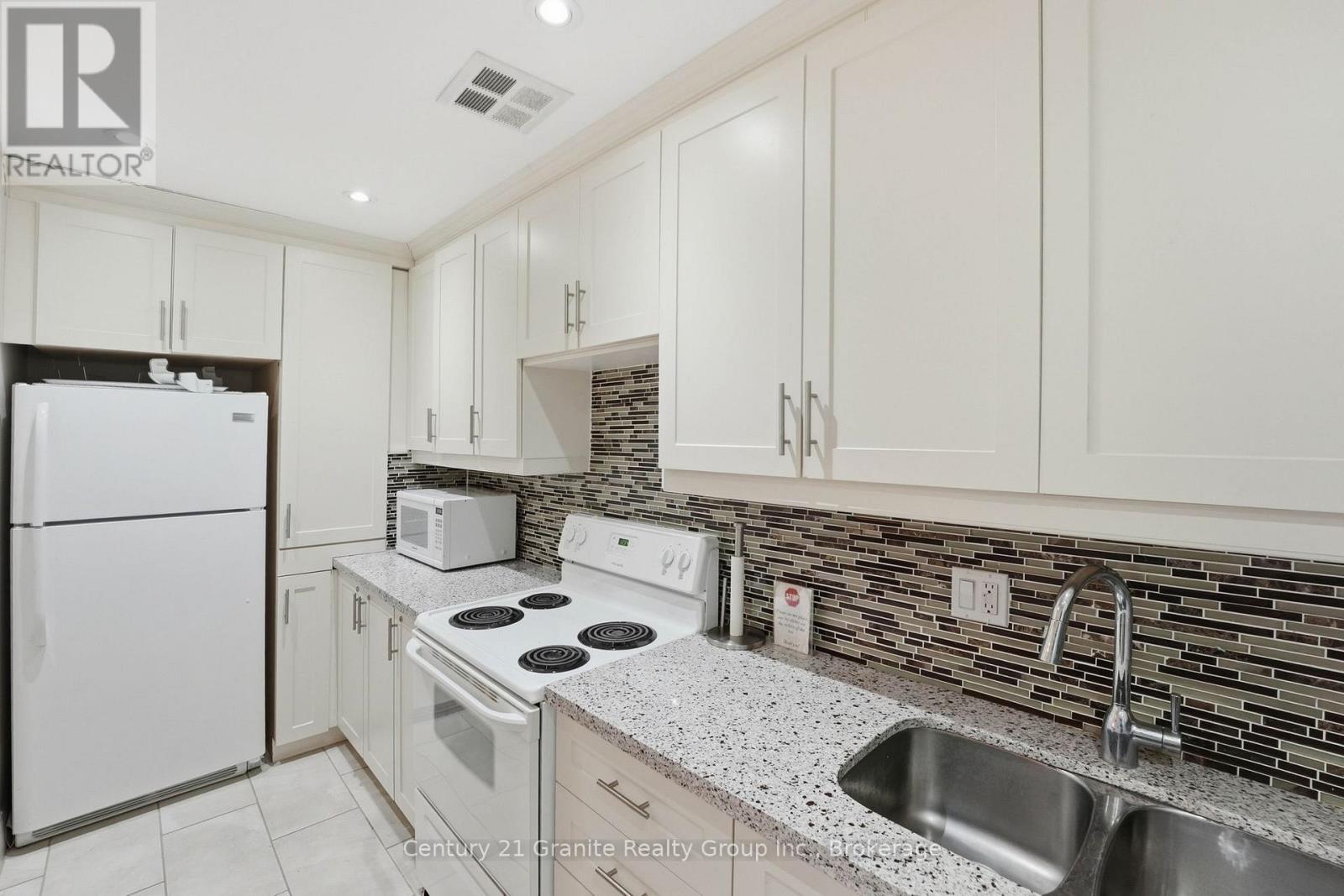 #180 1 GREYSTONE WALK DRIVE - 32