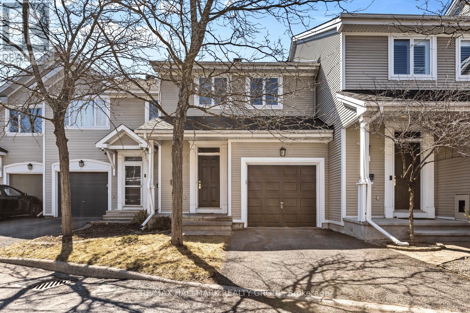 Front exterior with attached garage