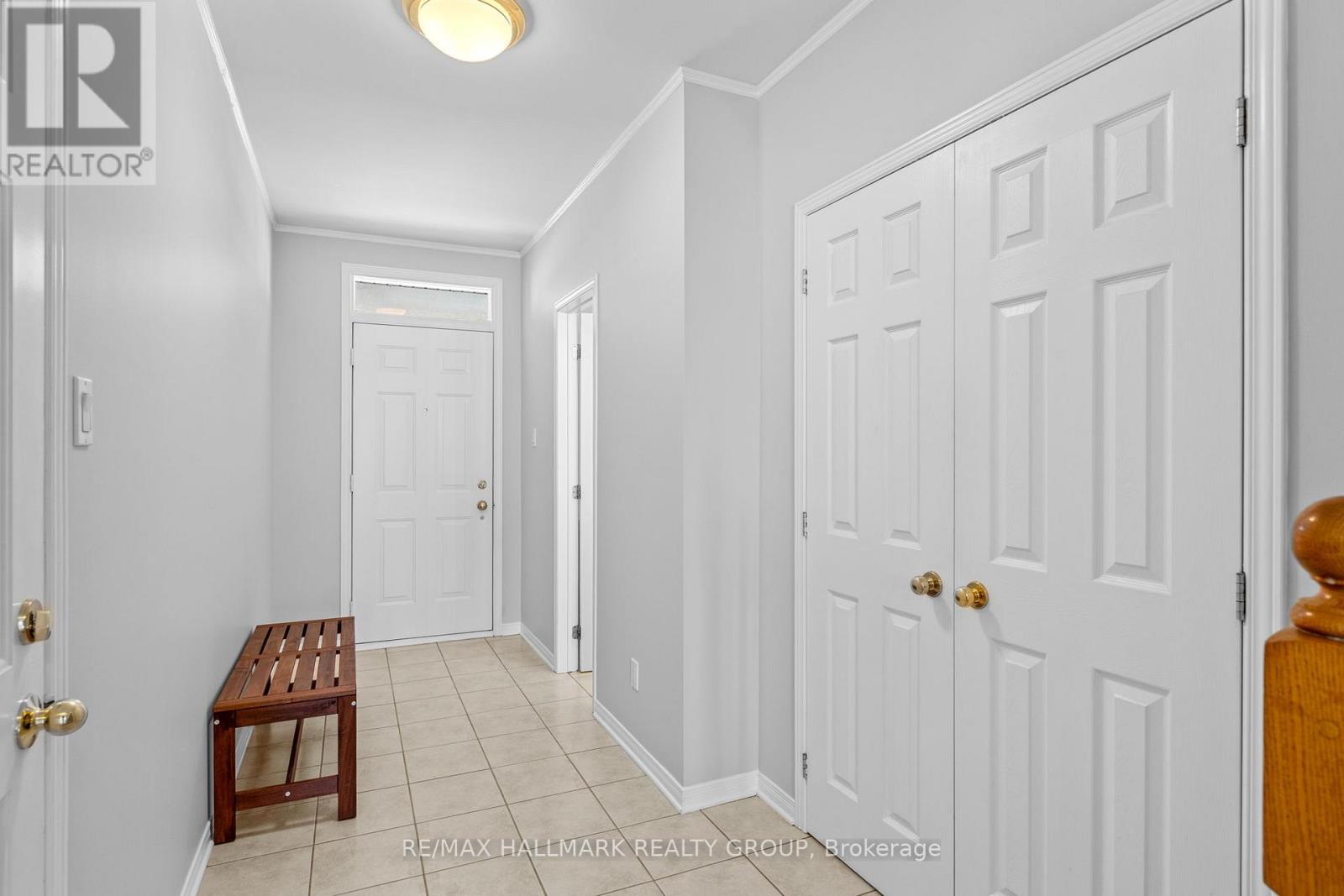 Entry hallway with closet and storage