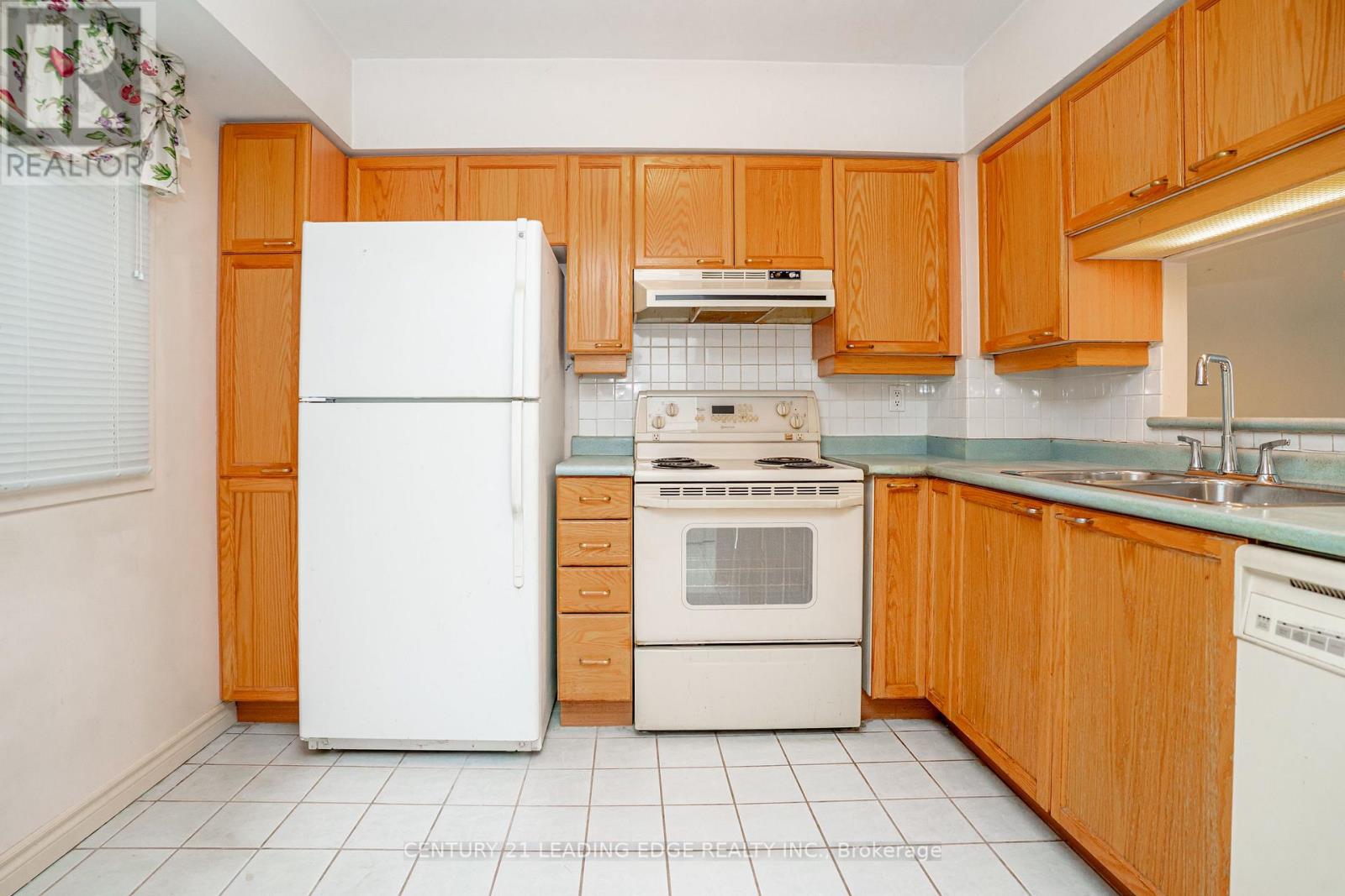 #210 115 BONIS AVENUE - 11