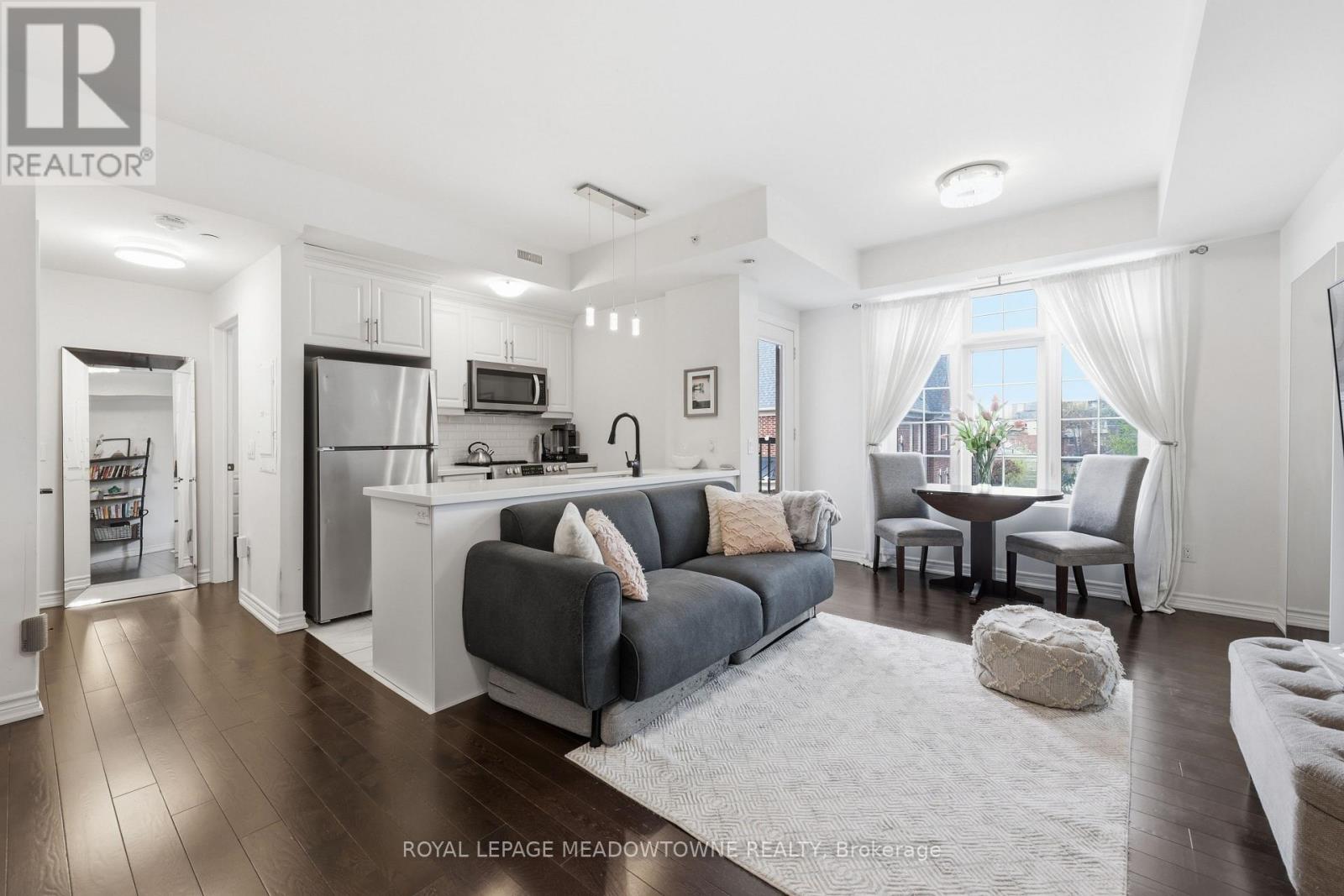 #203 215 BROADWAY STREET - 10