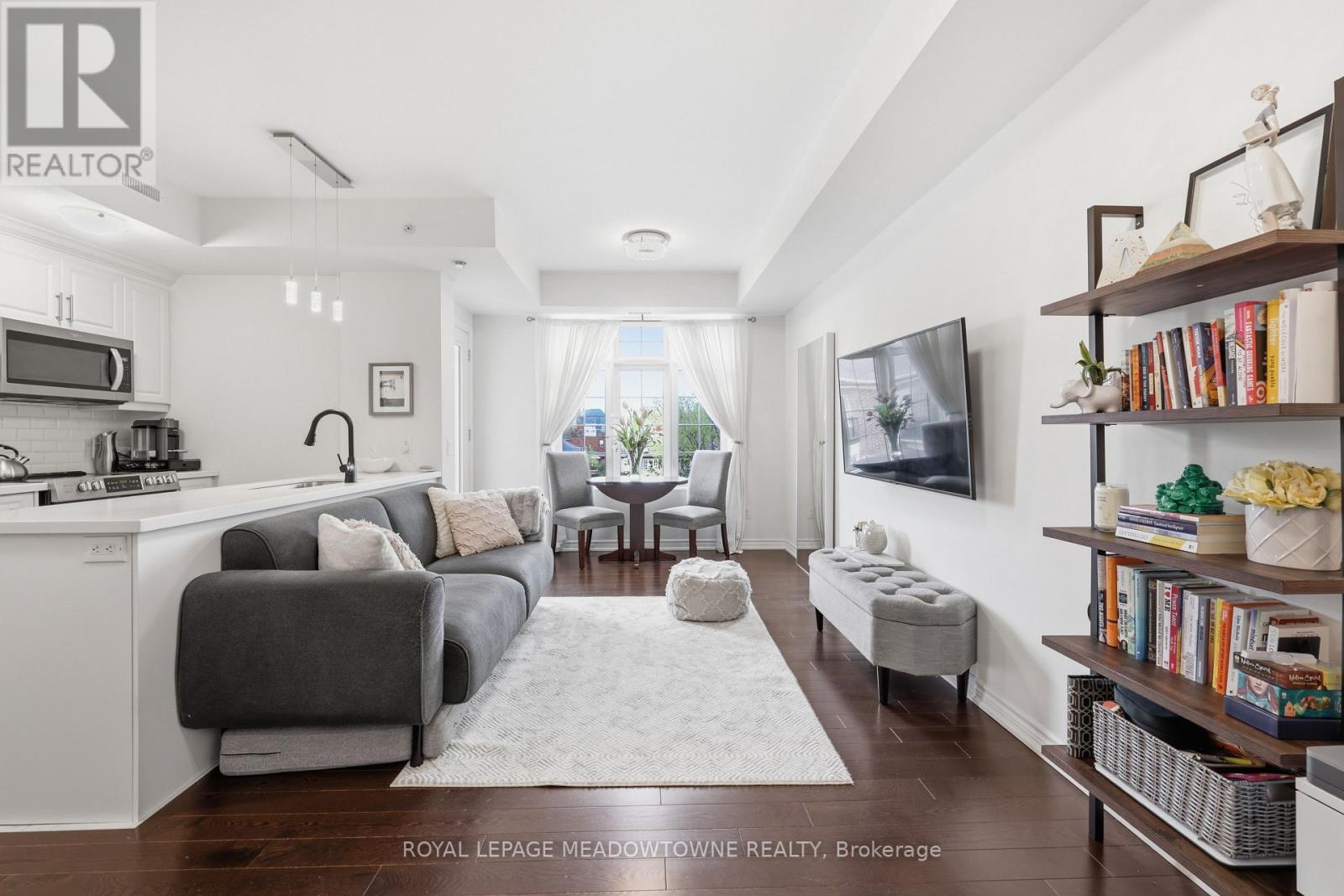 #203 215 BROADWAY STREET - 11