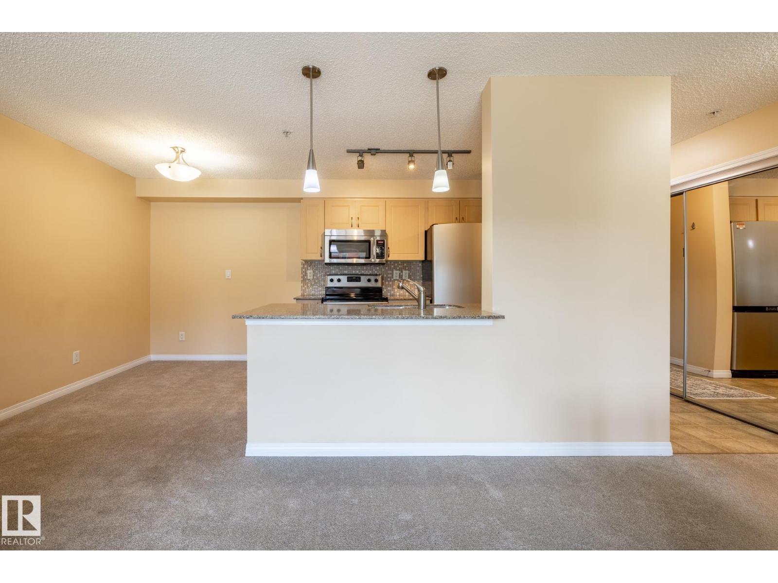 #214 13907 136 ST NW - 35