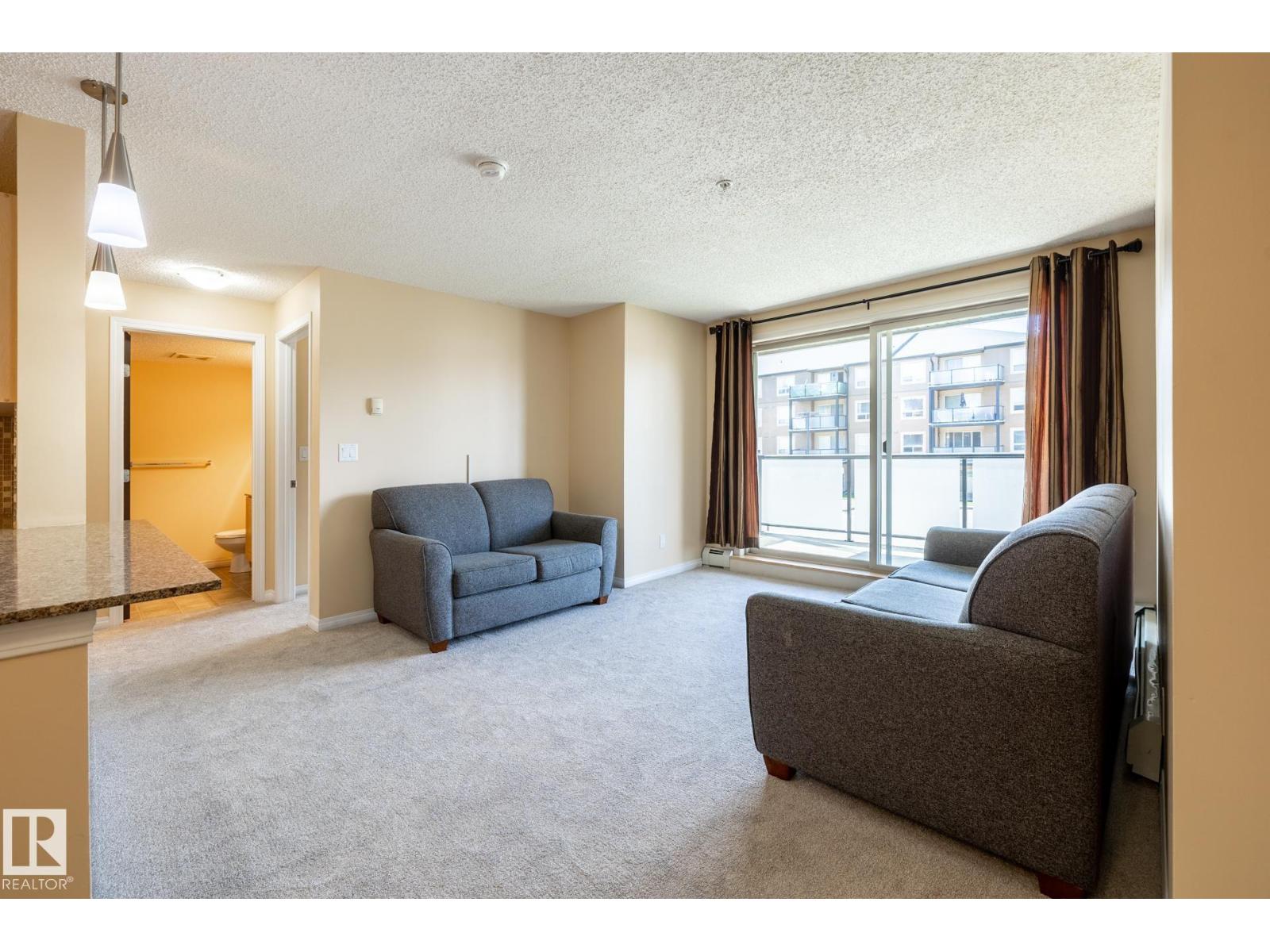 #214 13907 136 ST NW - 8
