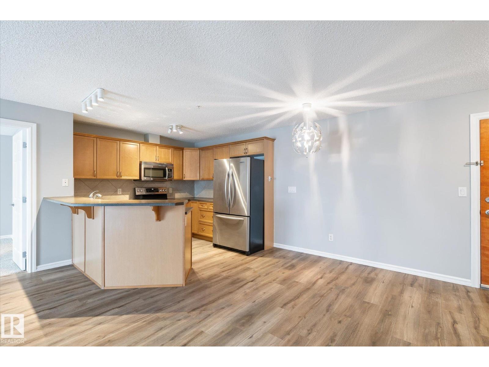 #205 13710 150 AV NW - 11