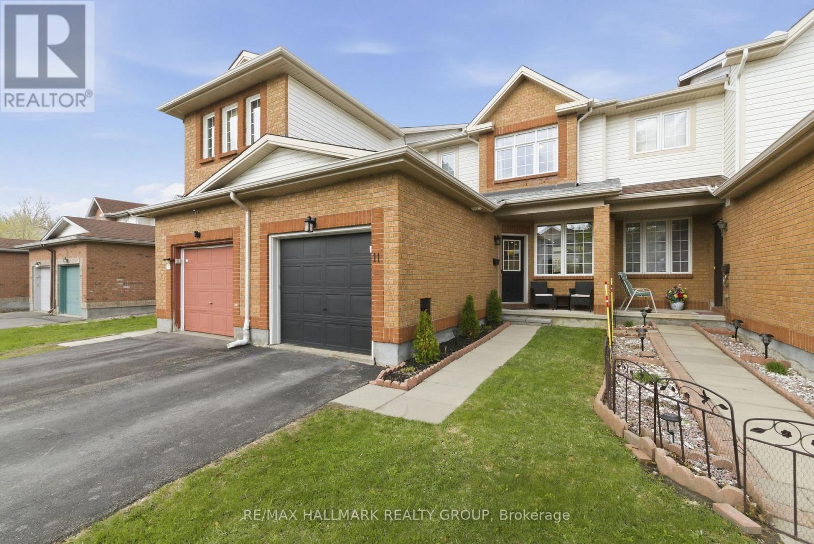 Front Entry And Curb Appeal with asphalt driveway