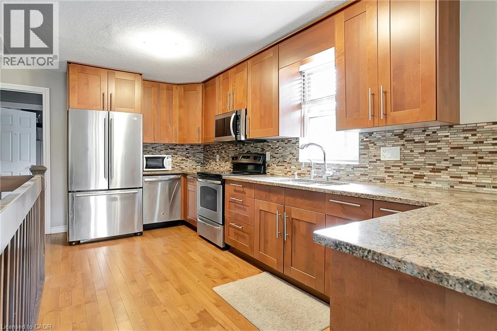 1392 DOON VILLAGE Road, Kitchener, Ontario, N2P1A5 — Photo 7