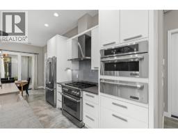Laundry room - 1085 Westpoint Drive, Kelowna, BC V1W4Z9 Photo 12