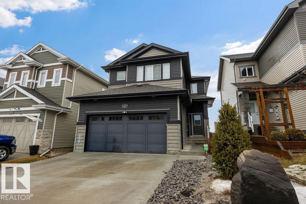 1057 COOPERS HAWK LI NW - 1