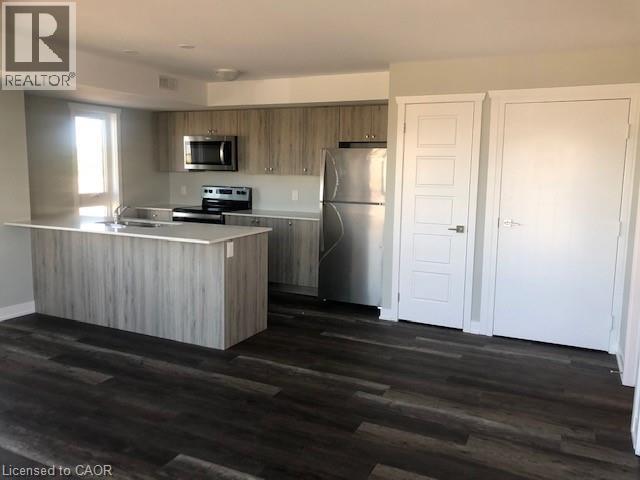 1331 COUNTRYSTONE Drive Unit# B15, Kitchener, Ontario, N2N0C5 — Photo 2