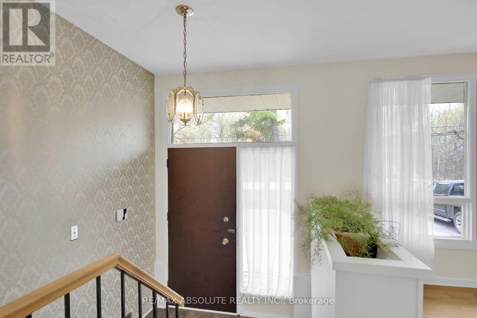 Bright large windows throughout.