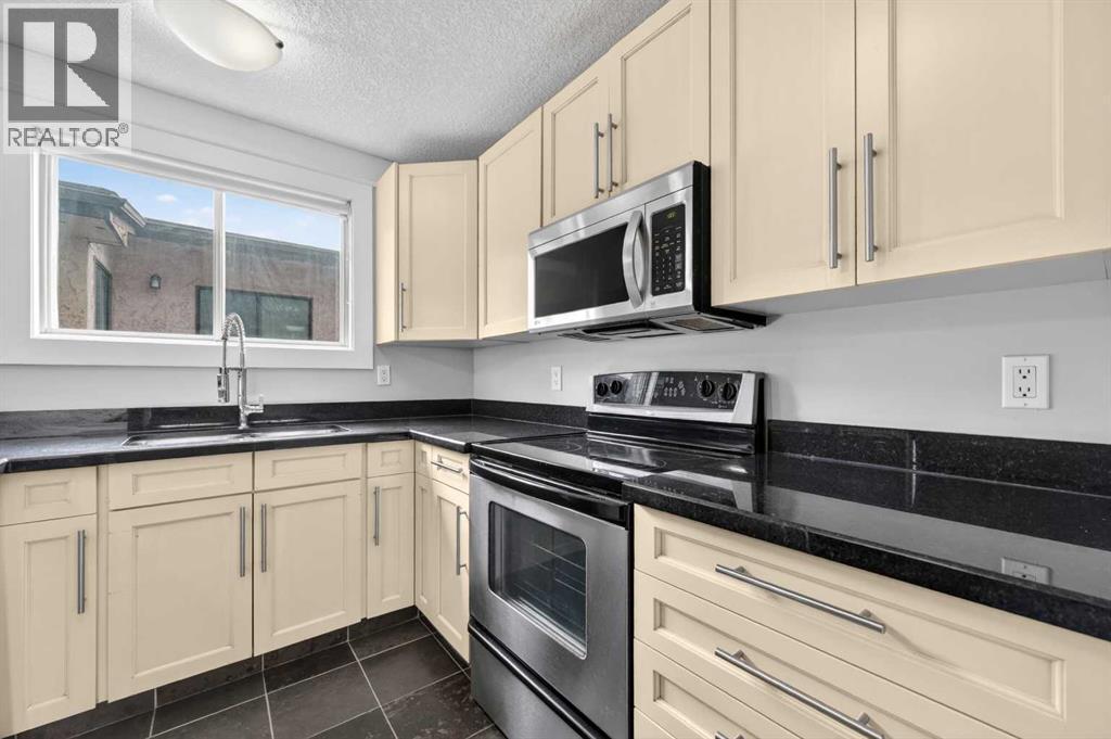 #203 644 Meredith Road NE - 6